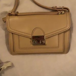 Cross body. Nude. Perfect condition never worn
